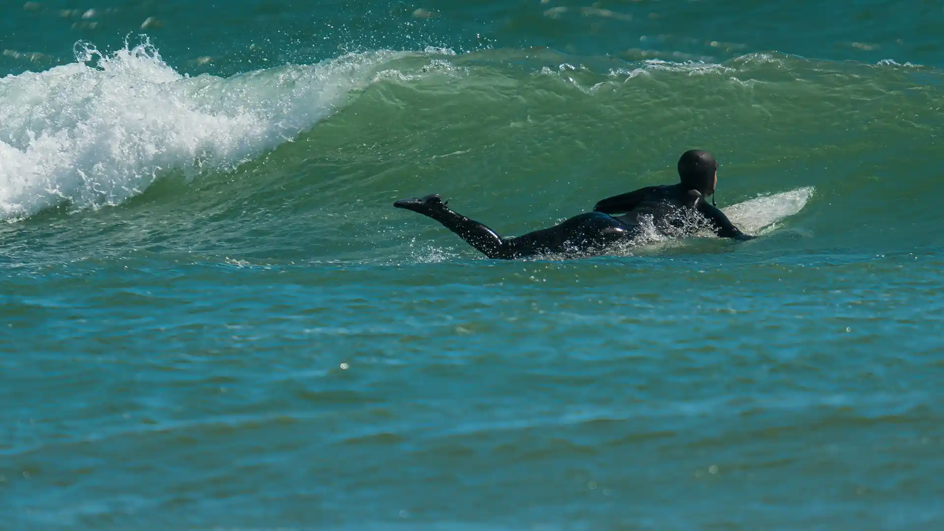 guide to mastering duck dive surfing with flowstate bali
